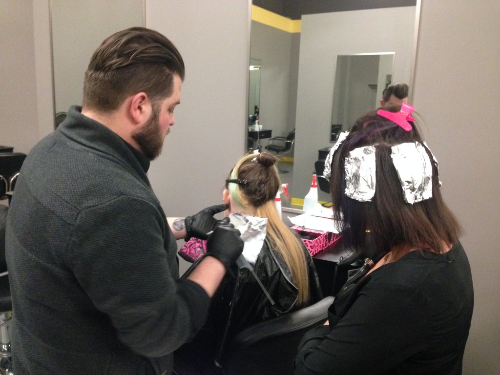 Davines Educator Josh Howard demonstrating on Amber's Beauty School Students