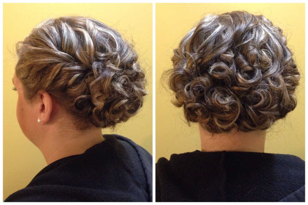 Curled and twisted updo by Amber's Beauty School students